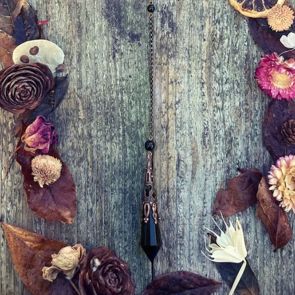 Black Obsidian Crystal Pendulum With Raven Skull