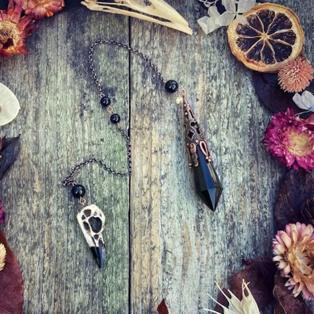 Black Obsidian Crystal Pendulum With Raven Skull